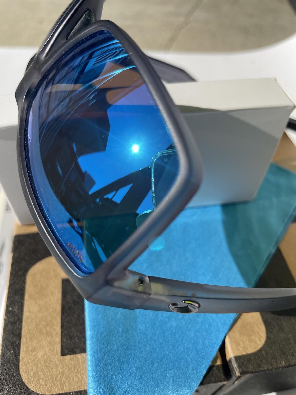 COSTA polarized – Smoke-Clear Frame W/ Blue Polarized lens
