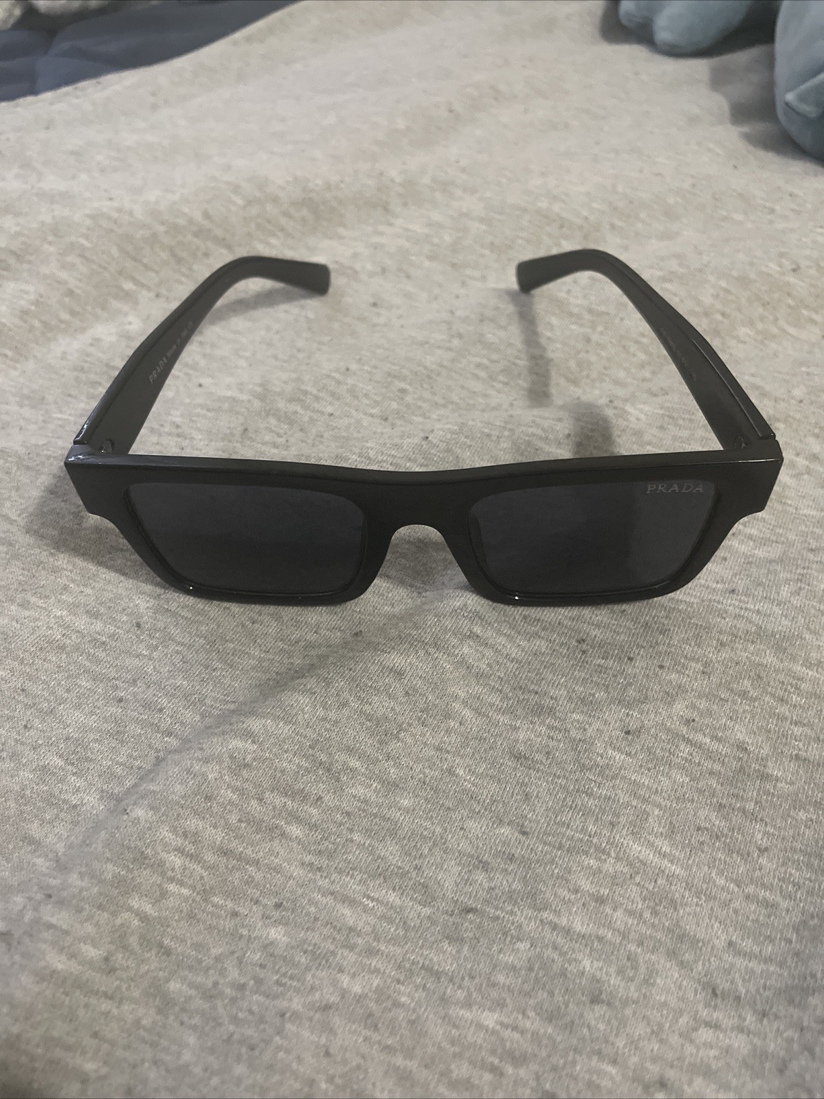 PRADA PR 27ZS Men’s Irregular Sunglasses – Black/Gray (PR 27ZS 16K08Z 54)