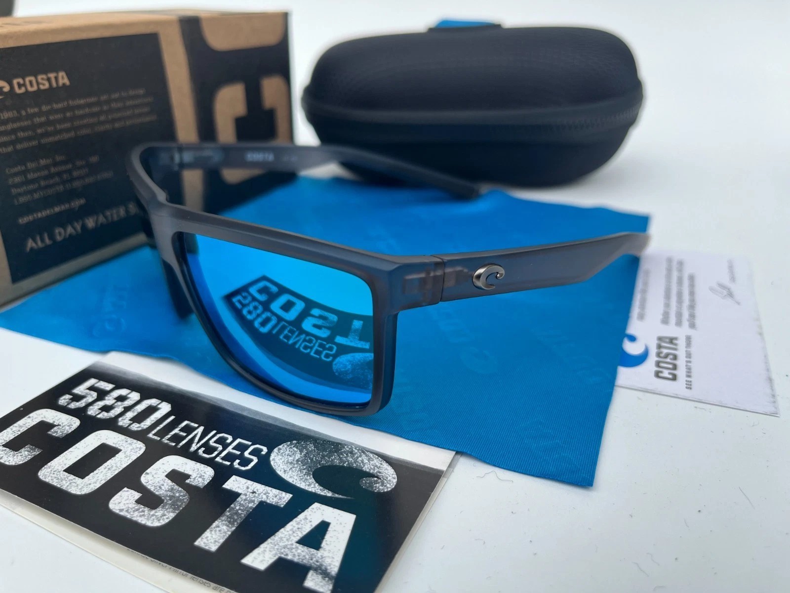 COSTA polarized – Smoke-Clear Frame W/ Blue Polarized lens