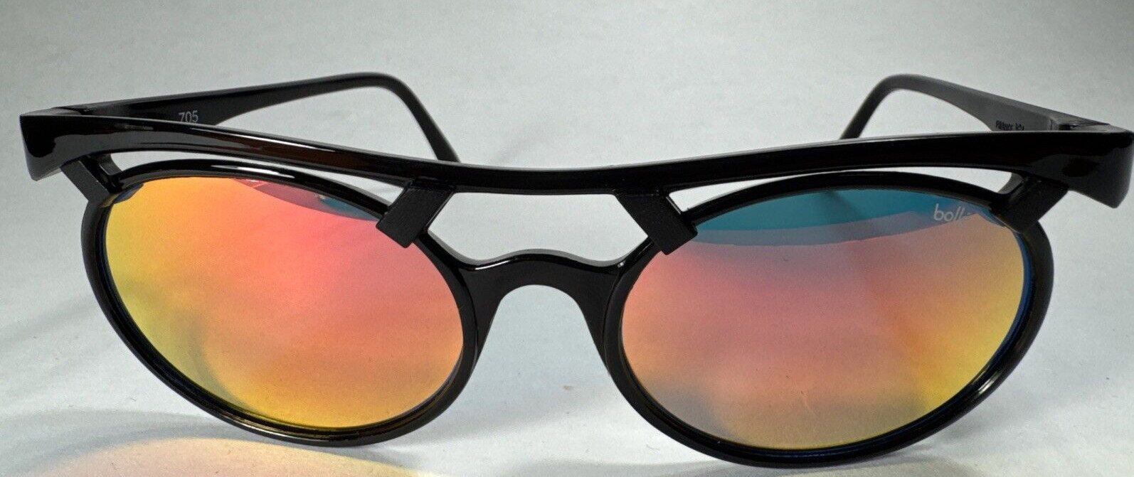 Bolle’ Reflective light Sunglasses Black 705 Oval Nylon Orange Mirror Lenses NOS