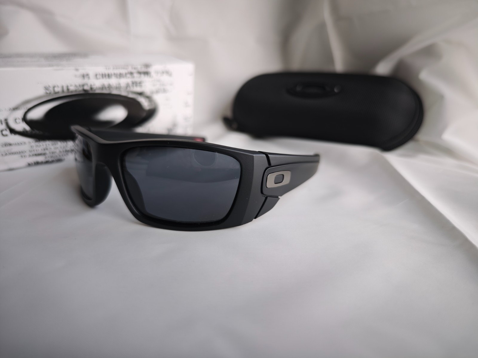 Oakley Fuel Cell Polarized OO9096-05 Black Frame Gray Lens