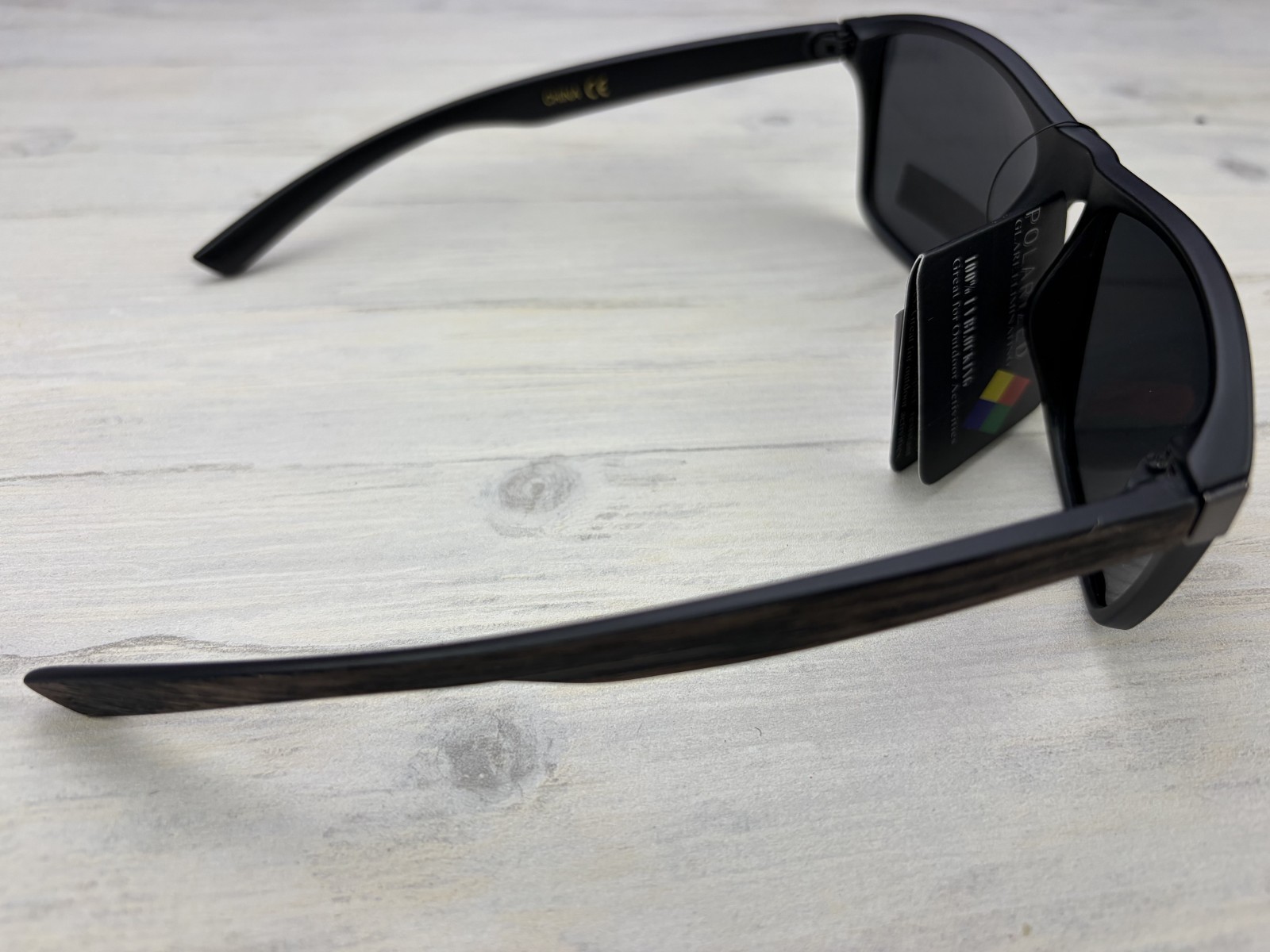 Polarized Sunglasses Black Frame Black/Brown Wood Grain Look Temples Gray Lens