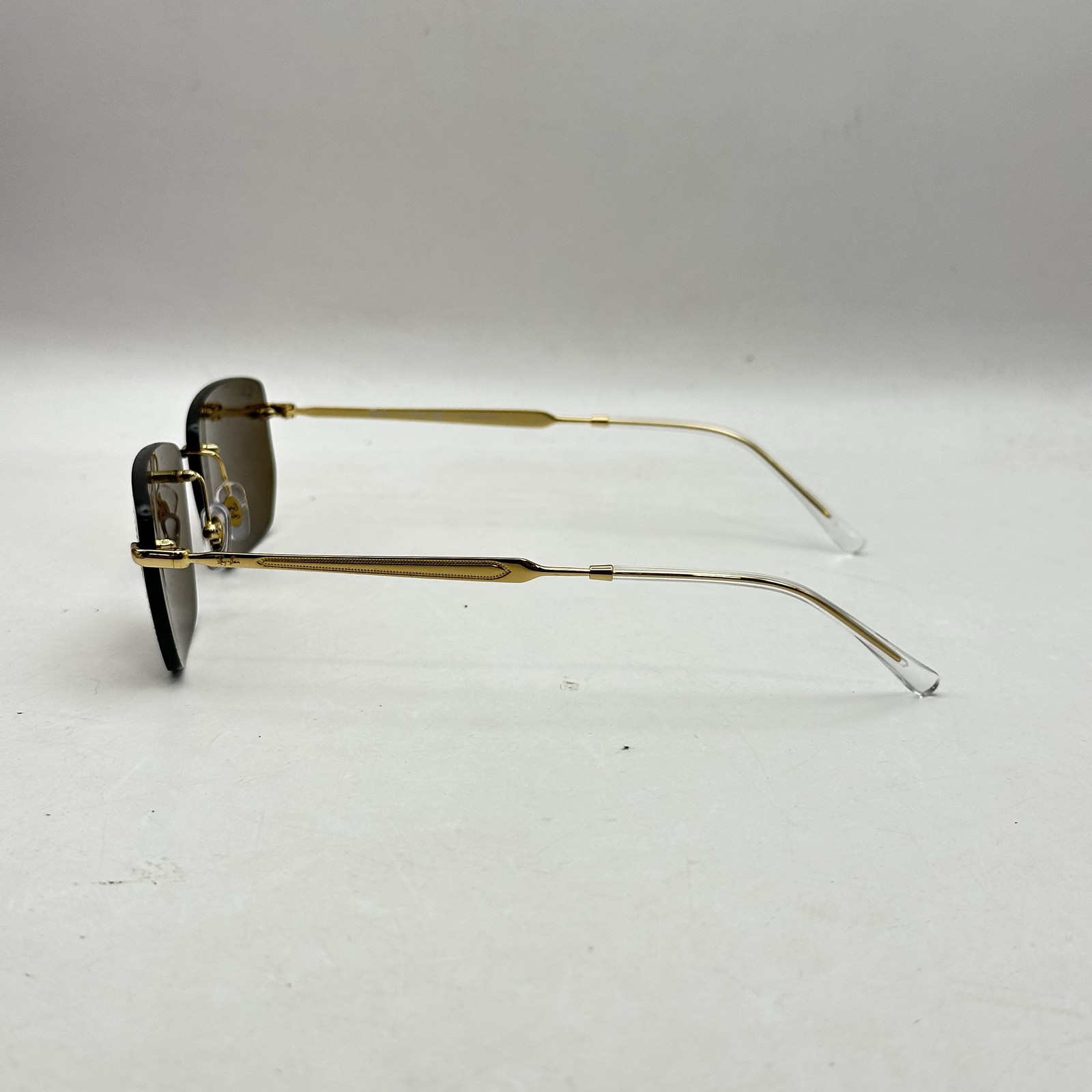 Ray Ban Mens Rimless Irregular Thin Metal Sunglasses RB3768 Gold/Dark Brown