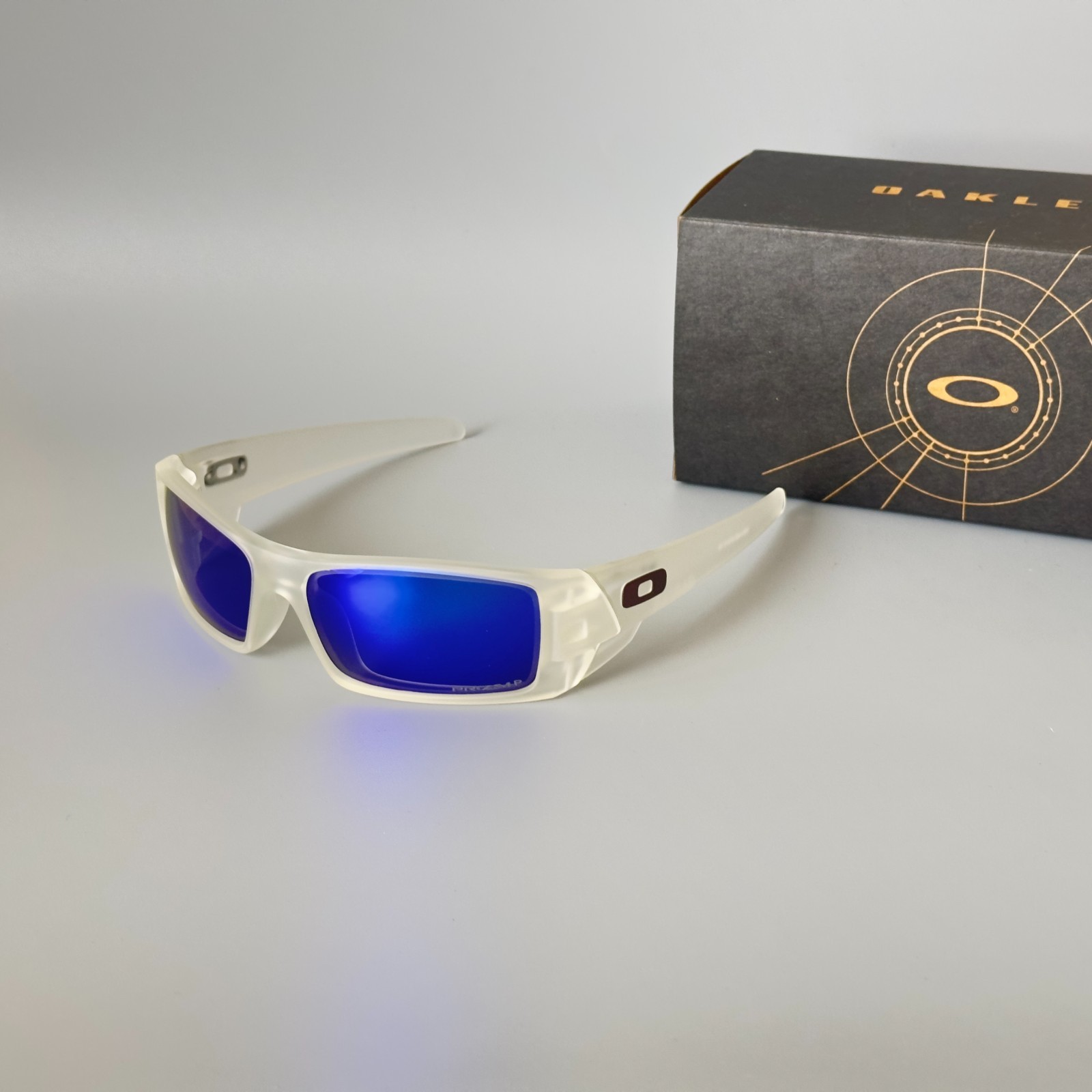 Oakley Gascan OO9014 Polarized Sunglasses Matte Clear Frame Blue Lens