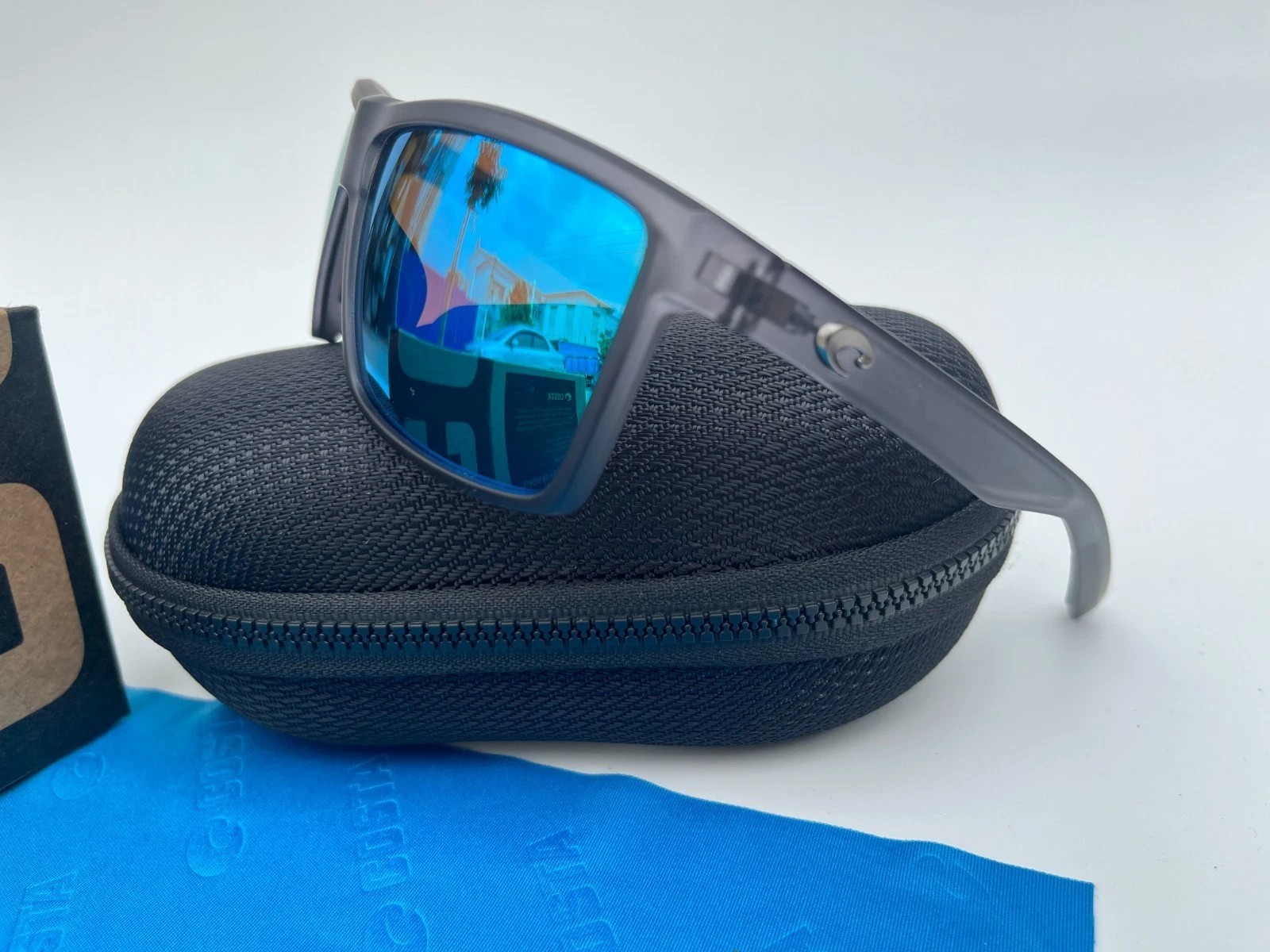 COSTA polarized – Smoke-Clear Frame W/ Blue Polarized lens