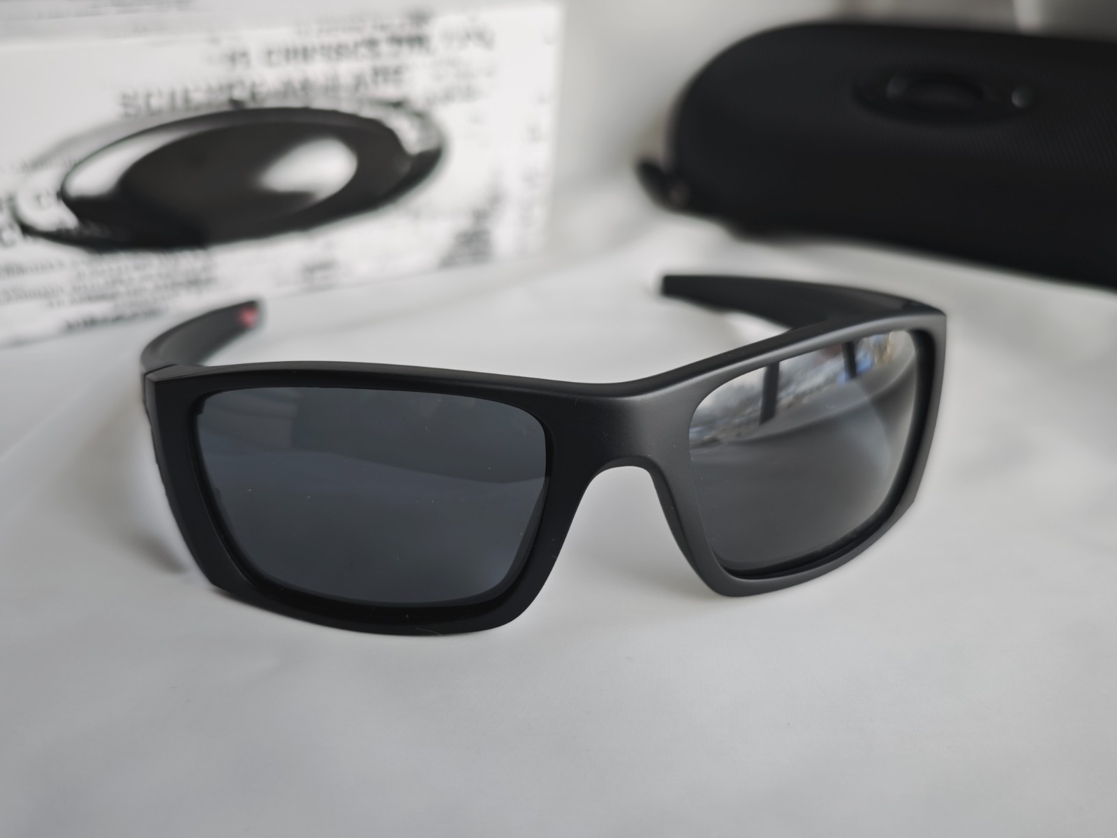 Oakley Fuel Cell Polarized OO9096-05 Black Frame Gray Lens