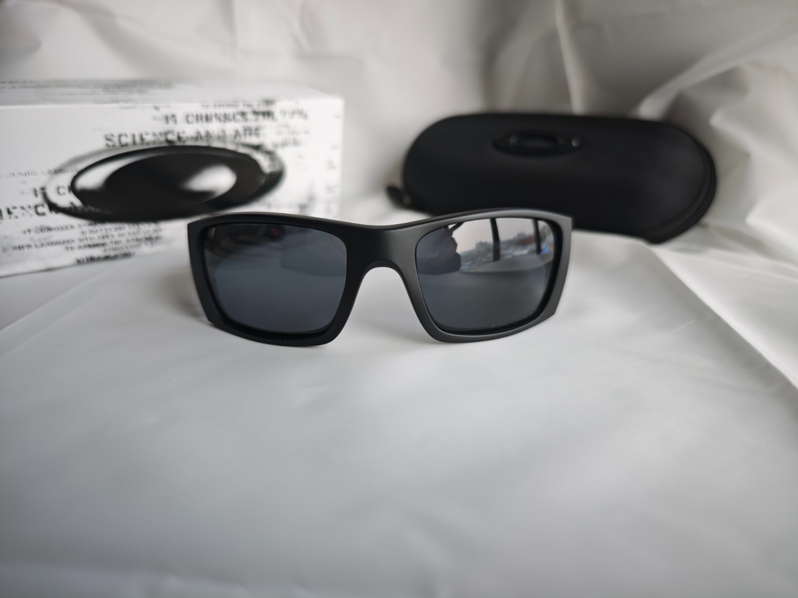 Oakley Fuel Cell Polarized OO9096-05 Black Frame Gray Lens