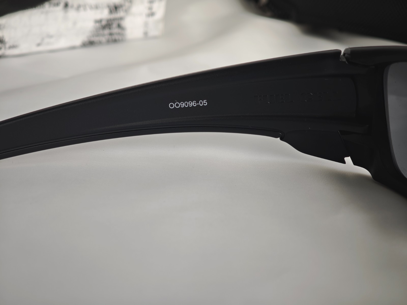 Oakley Fuel Cell Polarized OO9096-05 Black Frame Gray Lens