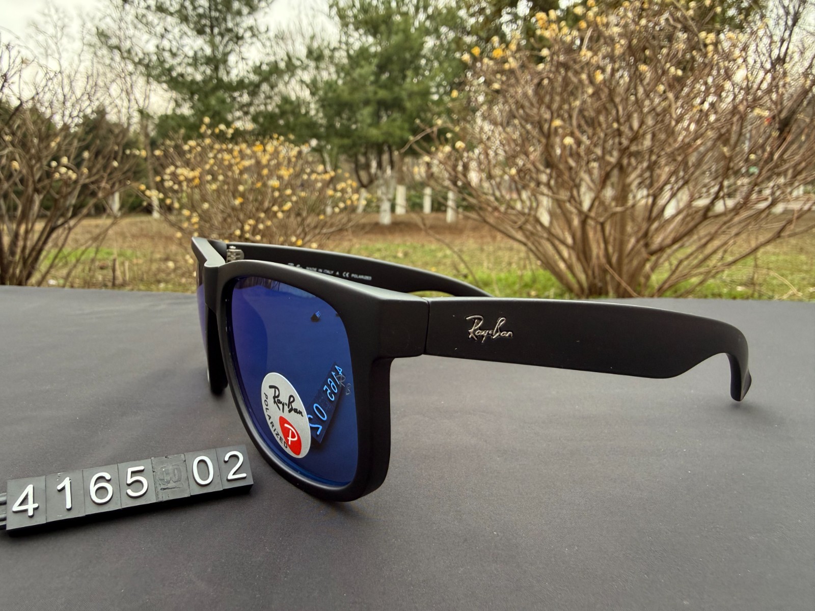 Ray-Ban RB4165 Sunglasses Matte Black Frame Polarized Blue Lens