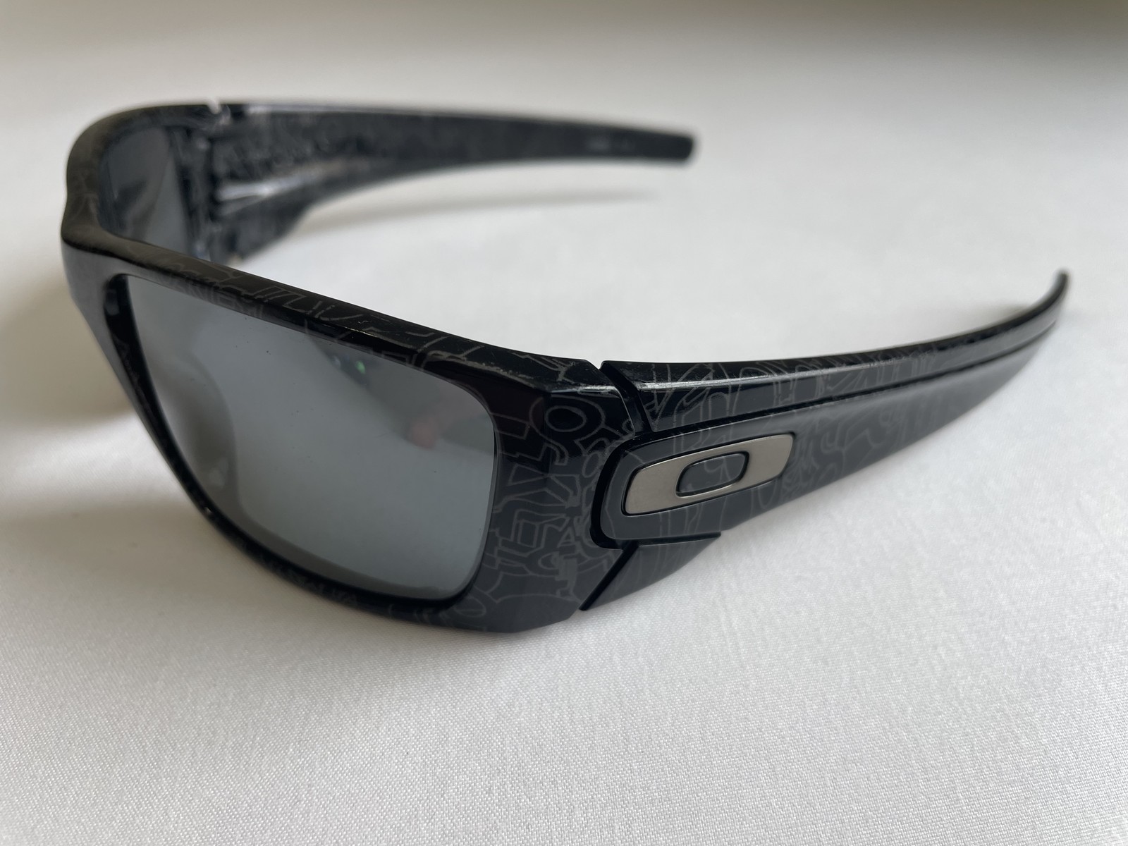 Oakley Fuel Cell Black / Silver Ghost Text – Black Iridium Polarized – NEAR MINT