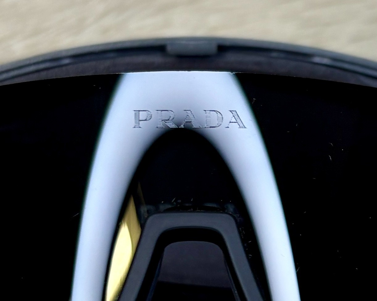 Large-size PRADA Eyewear sports sunglasses. 100% original