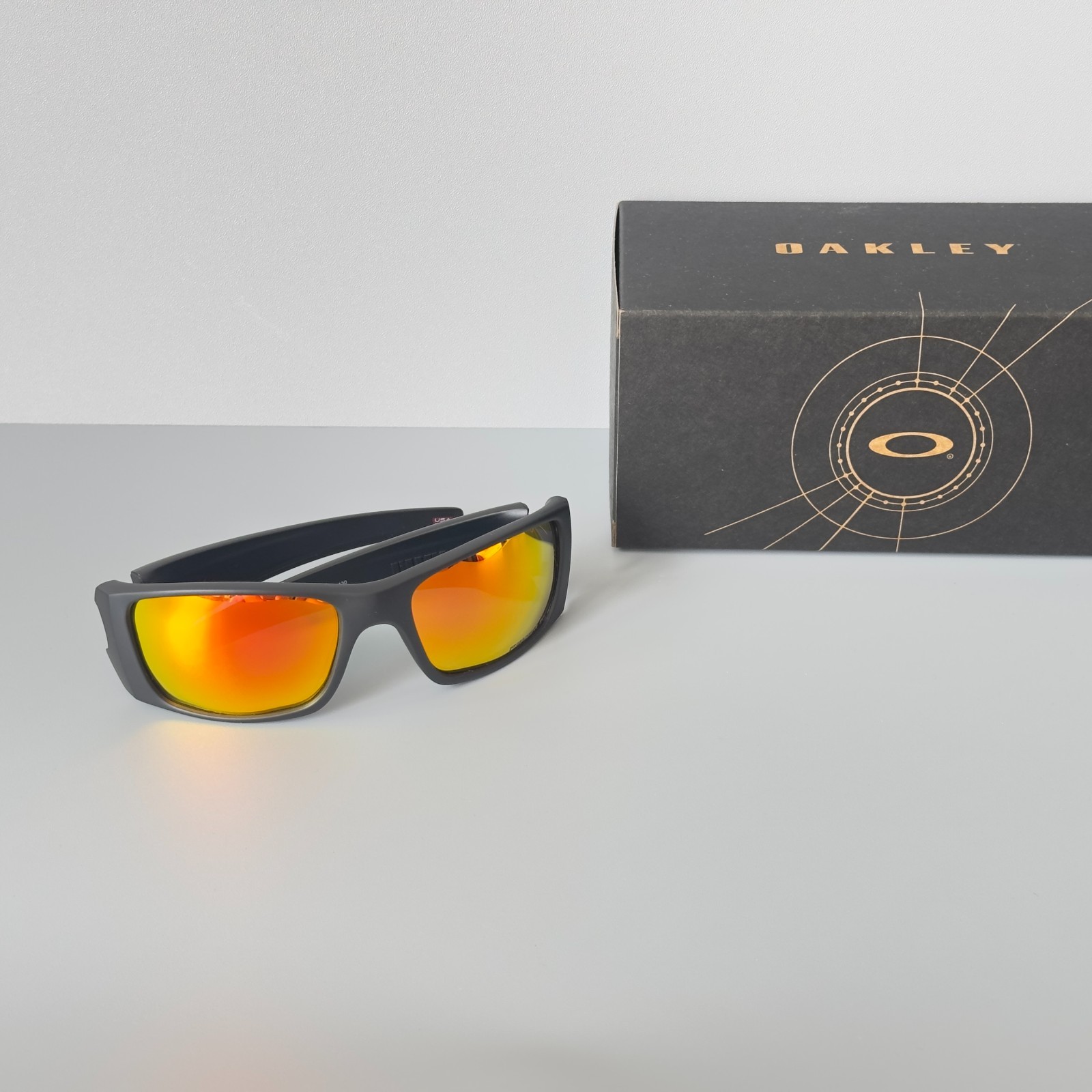 Oakley Fuel Cell OO9096 Polarized Sunglasses Matte Black Red Lens