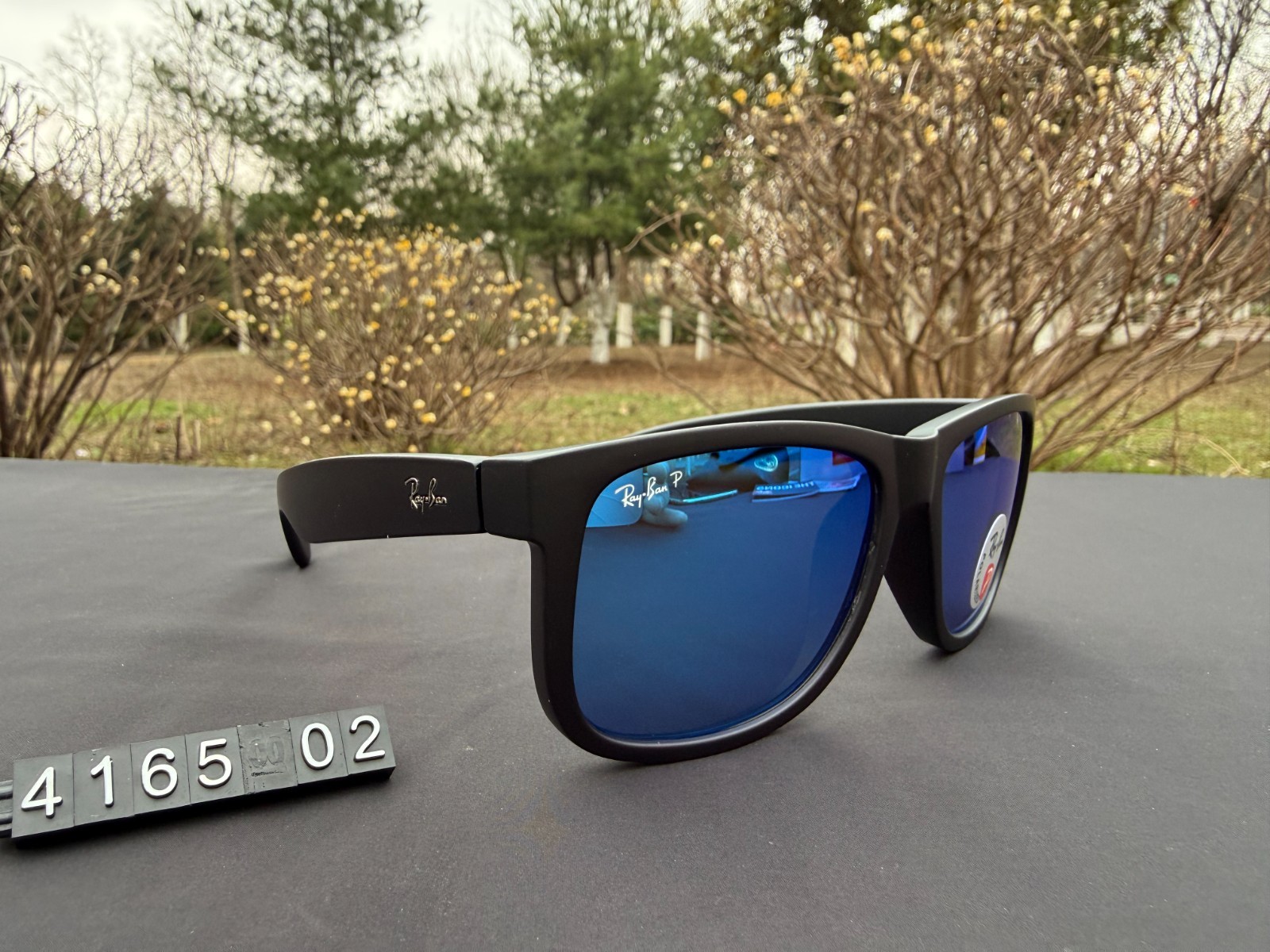 Ray-Ban RB4165 Sunglasses Matte Black Frame Polarized Blue Lens