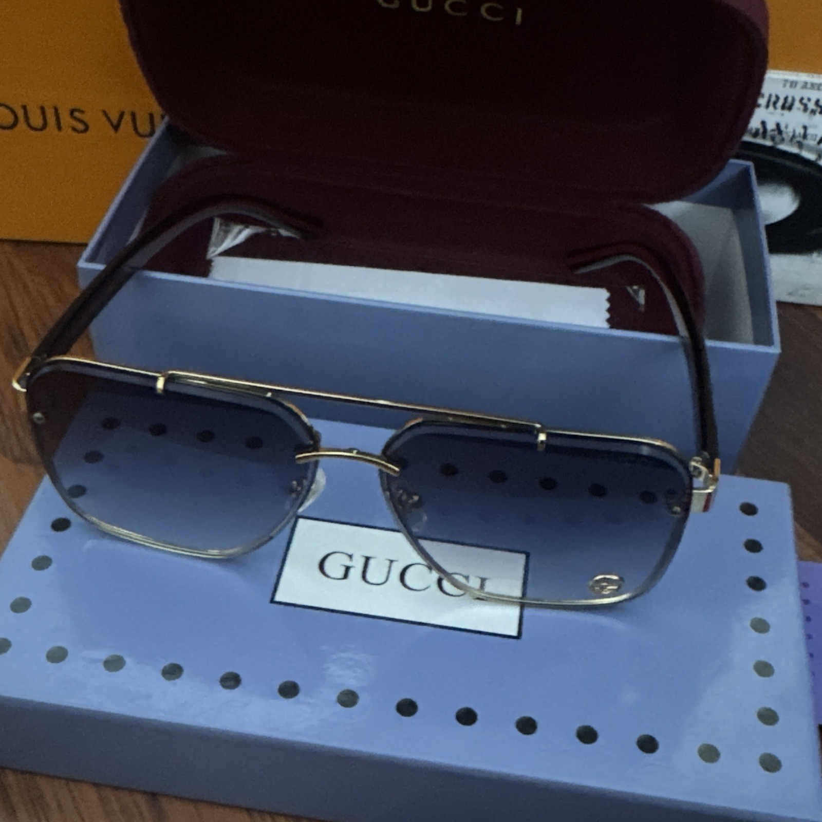 Gucci Men’s Aviator Sunglasses GG1419S Rimless Gold Metal Gray Gradient 145
