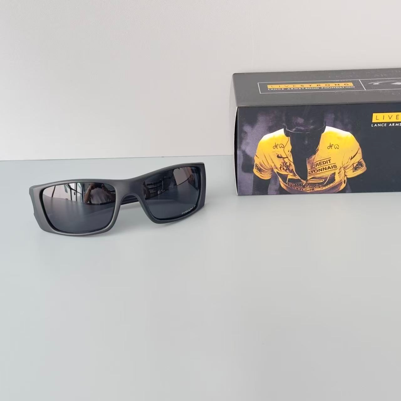 Oakley Fuel Cell OO9096 Polarized Sunglasses Black Frame Black Lens USA Flag