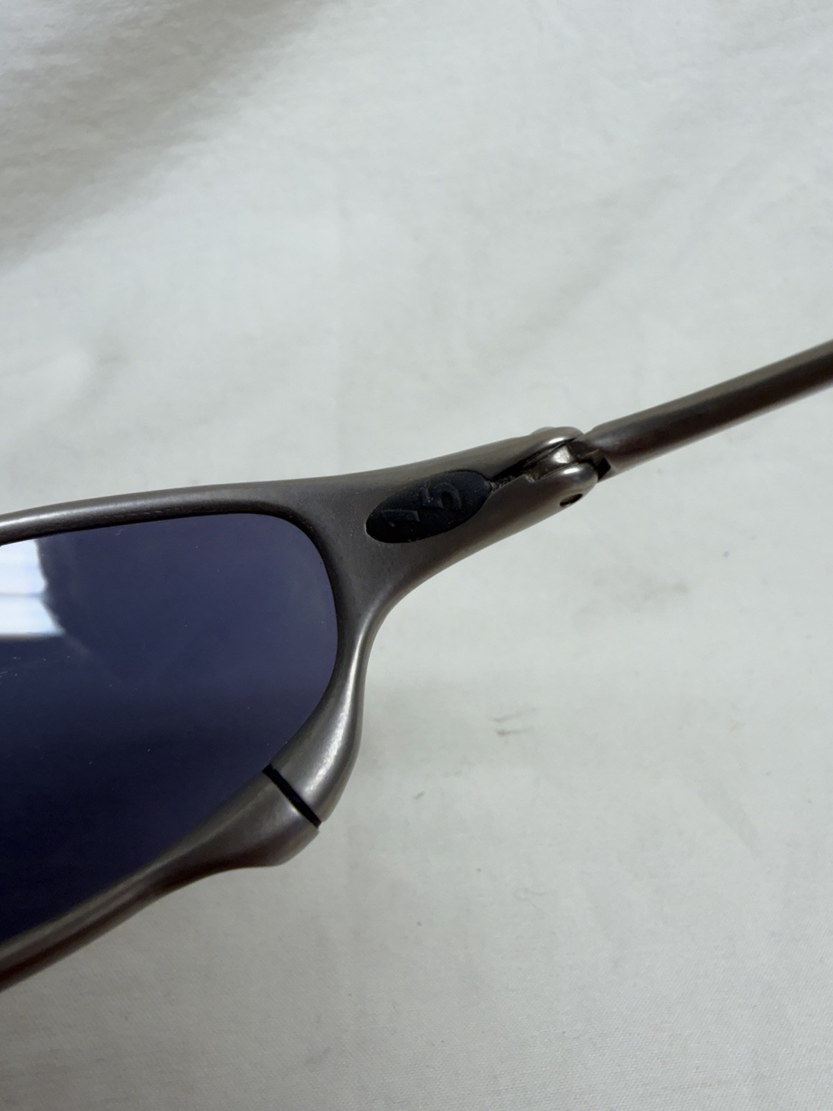 Vintage Oakley Juliet X Metal Plasma Ice Iridium Sunglasses JE041982A USA 2004
