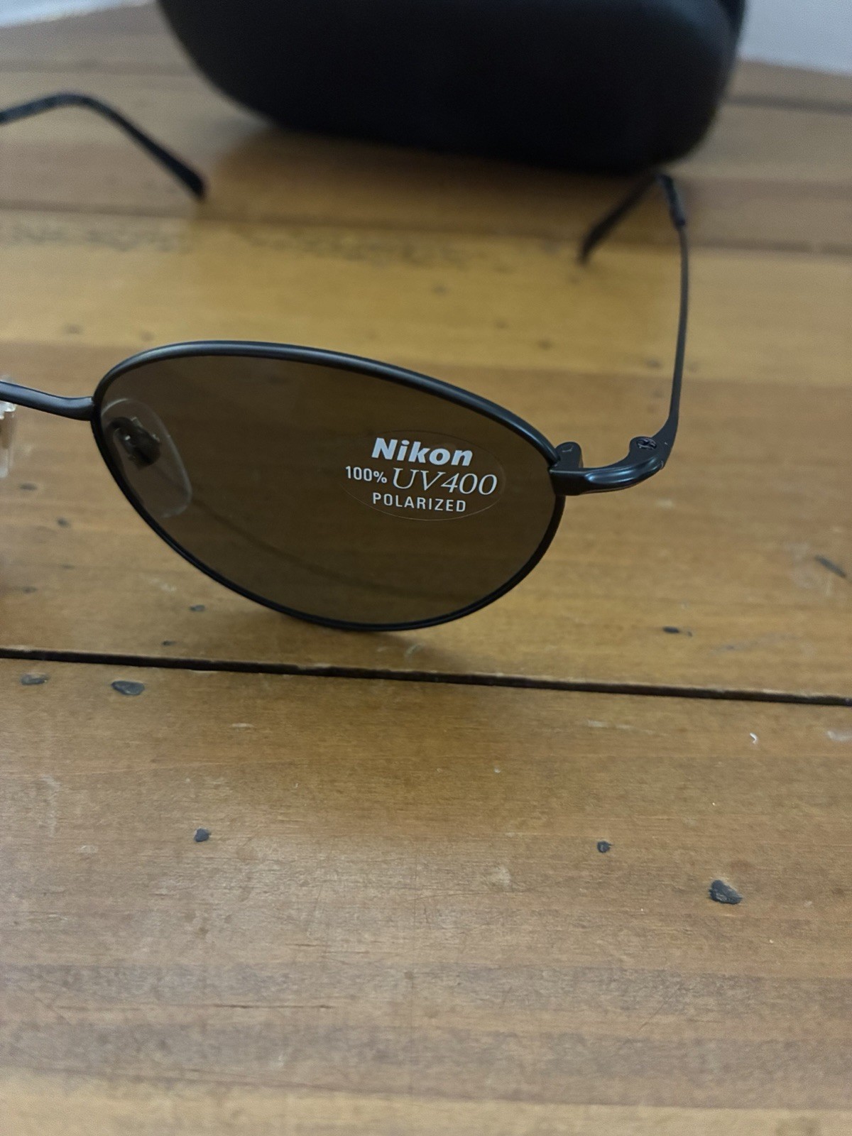 NikonOval Sunglasses Black Metal Frame Tinted Polarized Lens UV400 w/ case VTG