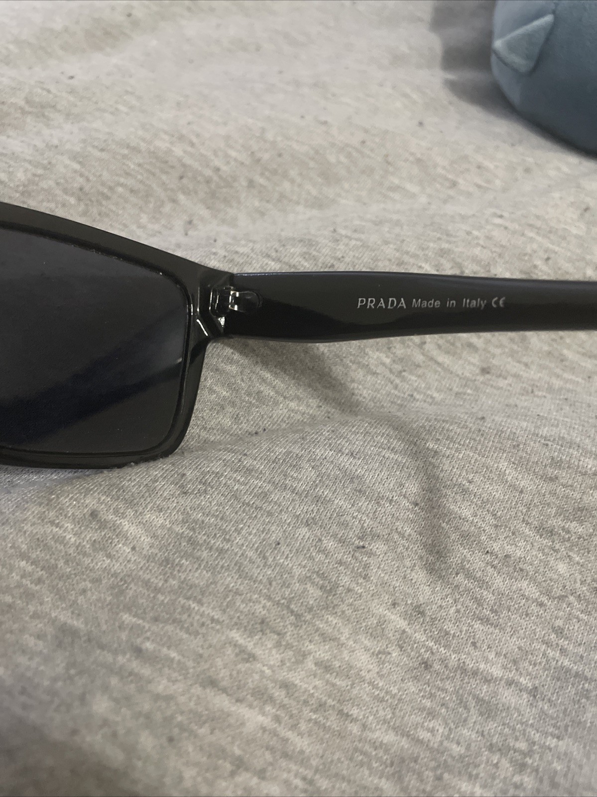 PRADA PR 27ZS Men’s Irregular Sunglasses – Black/Gray (PR 27ZS 16K08Z 54)