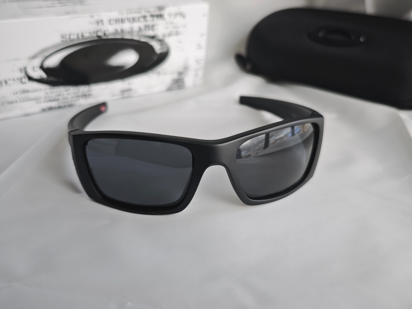 Oakley Fuel Cell Polarized OO9096-05 Black Frame Gray Lens