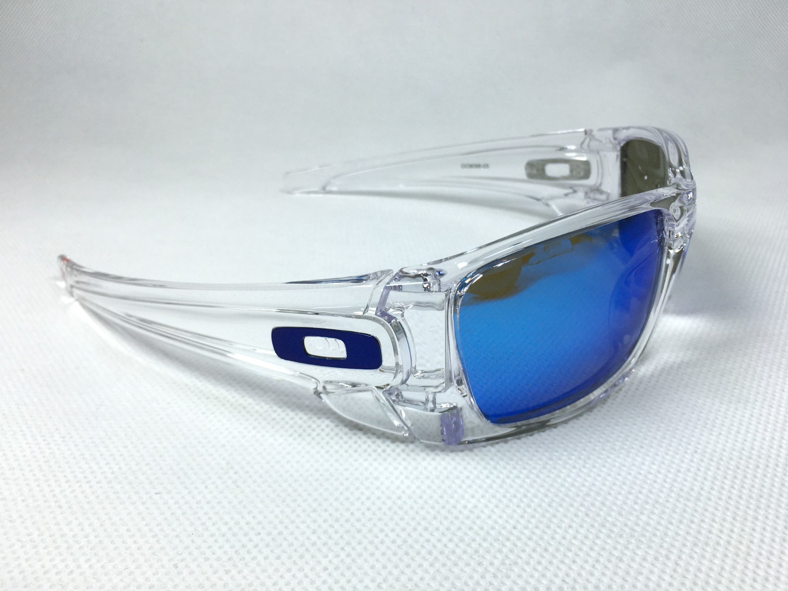Oakley Fuel Cell Clear Sunglasses / Blue Polarized Lens / Blue Icons – OO9096-03