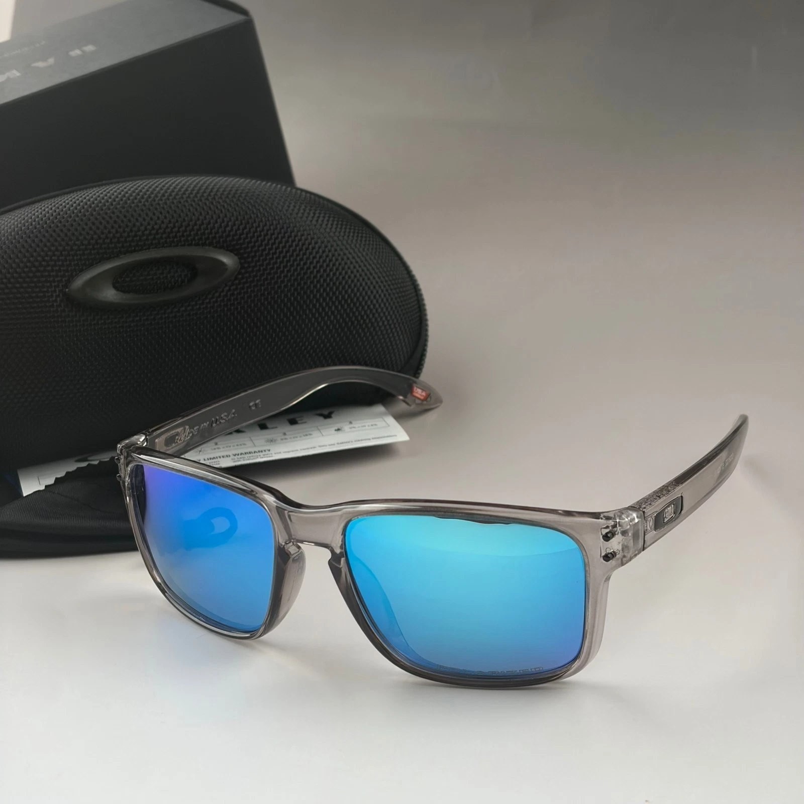 Oakley Holbrook Grey Smoke Clear Frame Blue Mirror Polarized Lens Sunglasses NEW