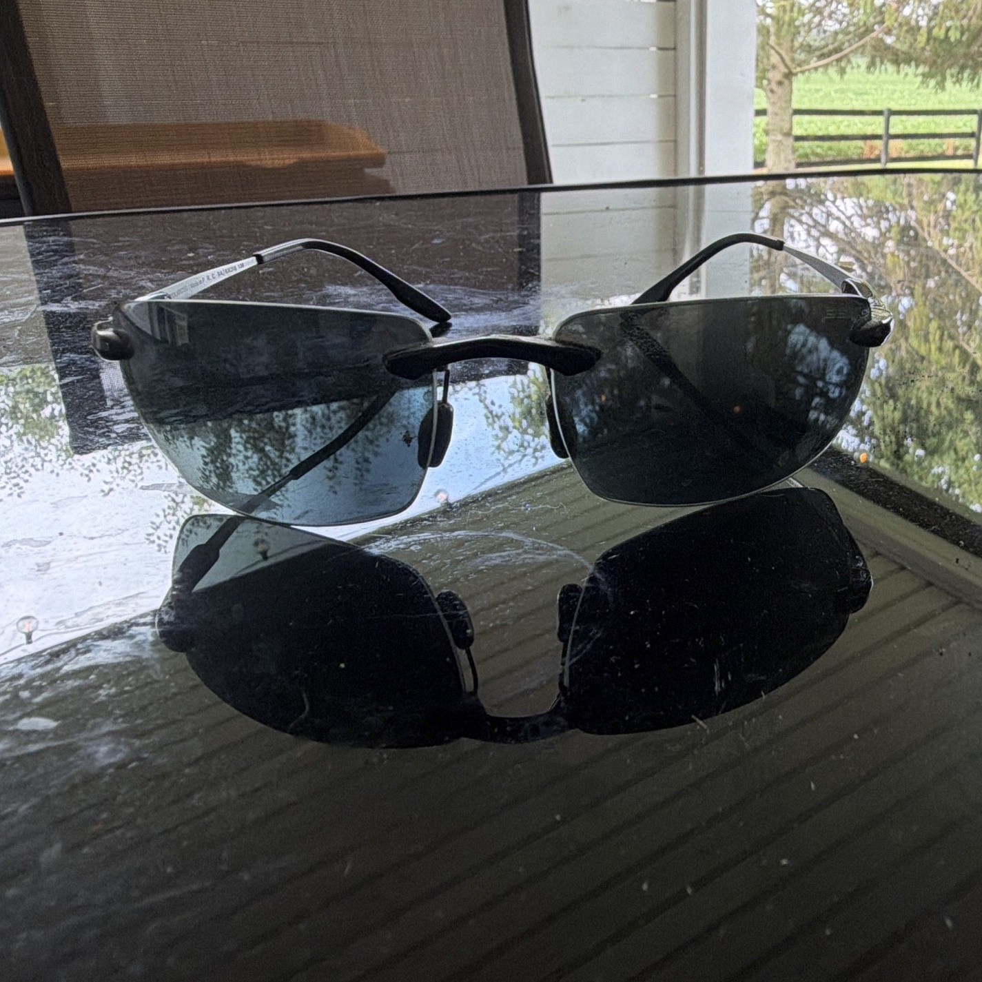 BEX Lightweight Rimless Wrap Sunglasses Silver Metal Frame Black Mirrored