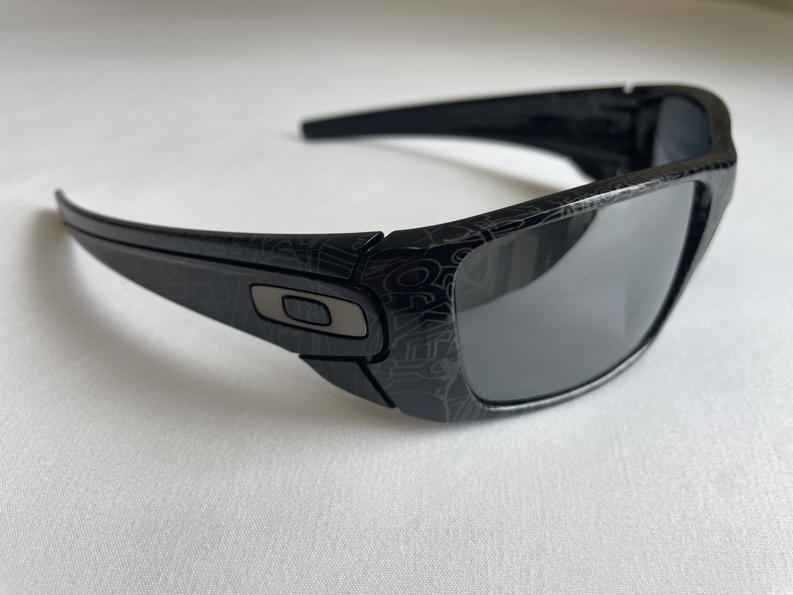 Oakley Fuel Cell Black / Silver Ghost Text – Black Iridium Polarized – NEAR MINT