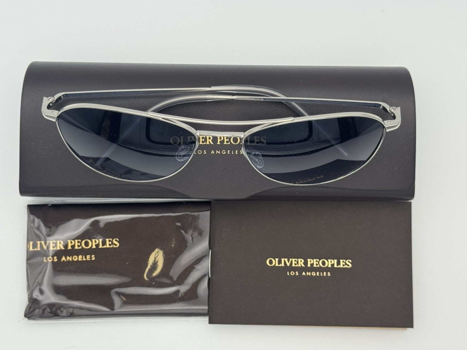 Oliver Peoples OV1358S 5036Q8 – AERO II – Silver / Marine Gradient (57MM)