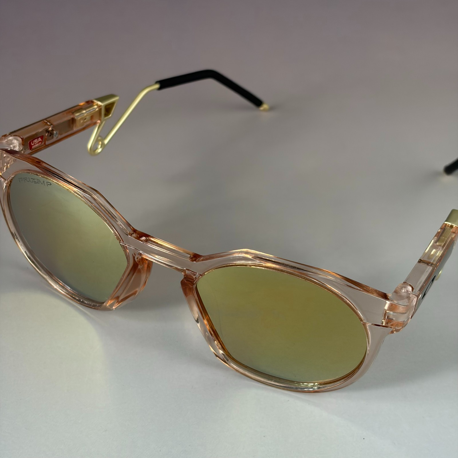 Oakley HSTN Metal Sunglasses Clear Pink Frame Prizm Gold Polarized New W/ Case