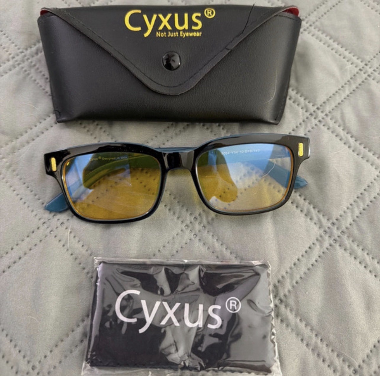 Cyxus Oval Sunglasses. Blue Frame Yellow Tinted. Plastic Lens. Unisex Adults.