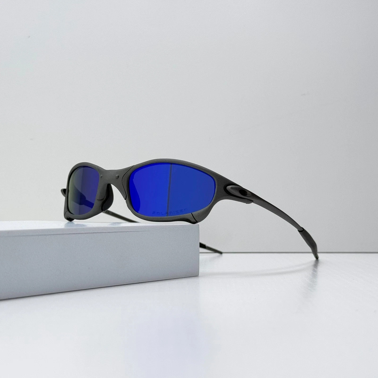 Oakley Juliet 1.0 X-Metal Sunglasses Dark Gray Frame Blue Polarized