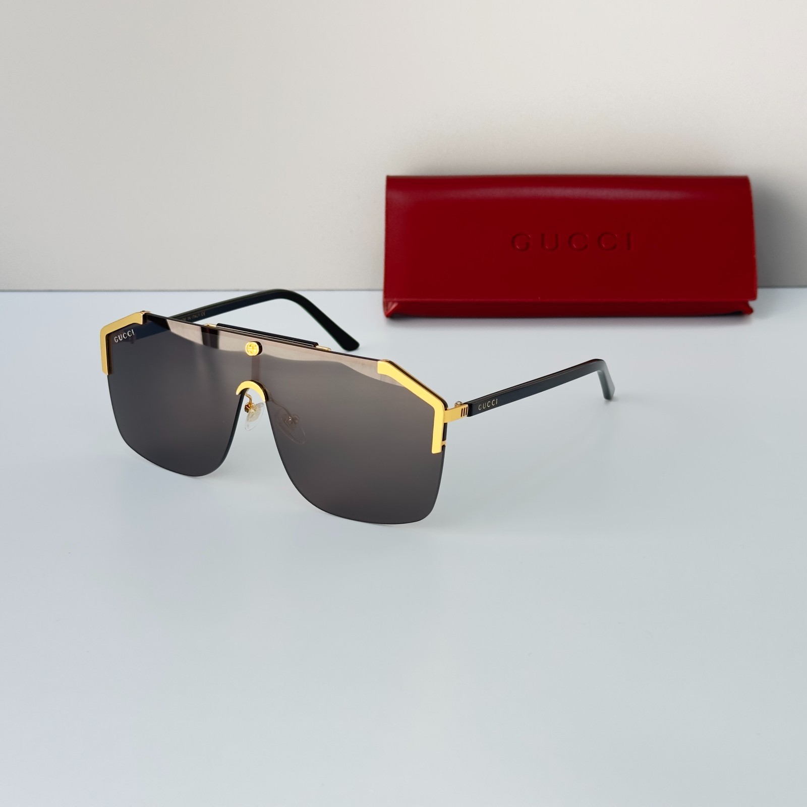 Gucci GG0291S Black Gold Frame Shield Black Lens Sunglasses Italy Luxury