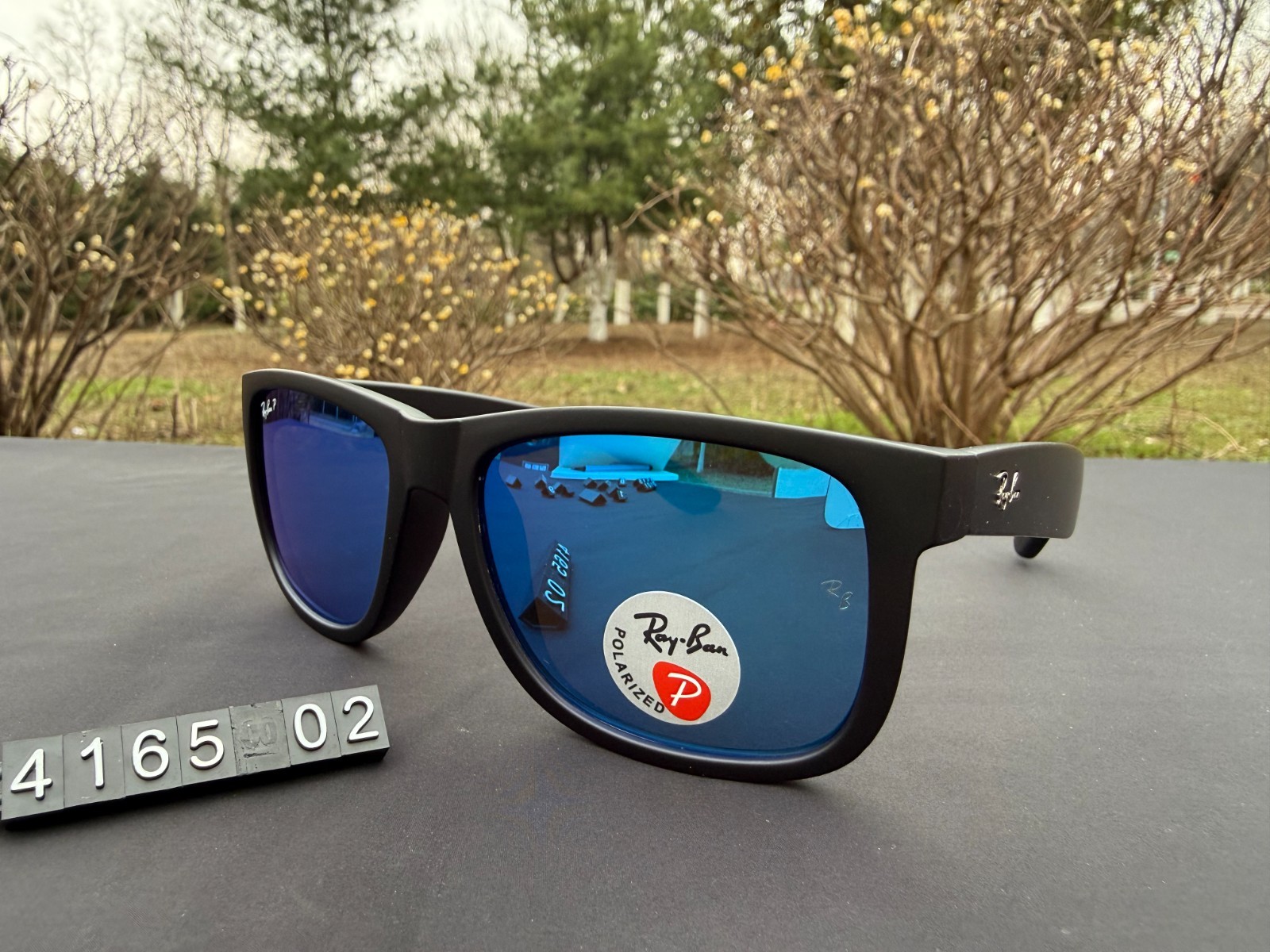 Ray-Ban RB4165 Sunglasses Matte Black Frame Polarized Blue Lens
