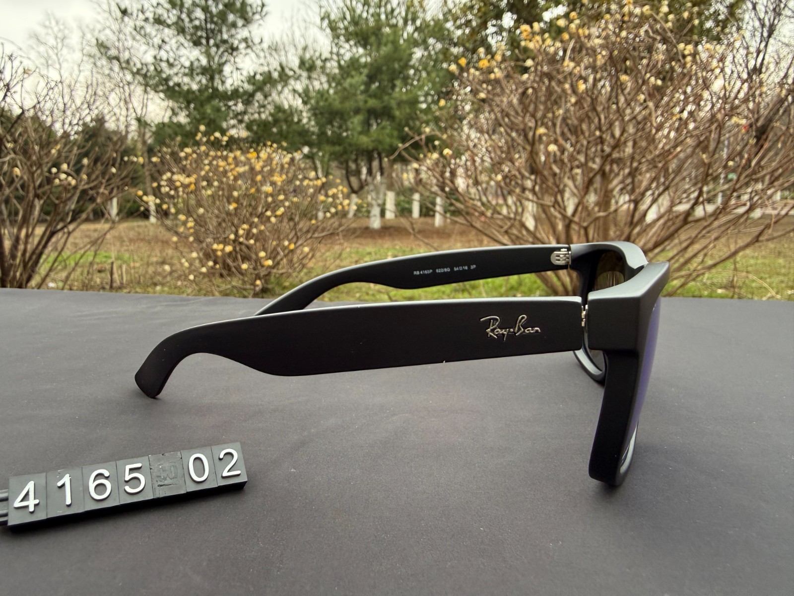 Ray-Ban RB4165 Sunglasses Matte Black Frame Polarized Blue Lens