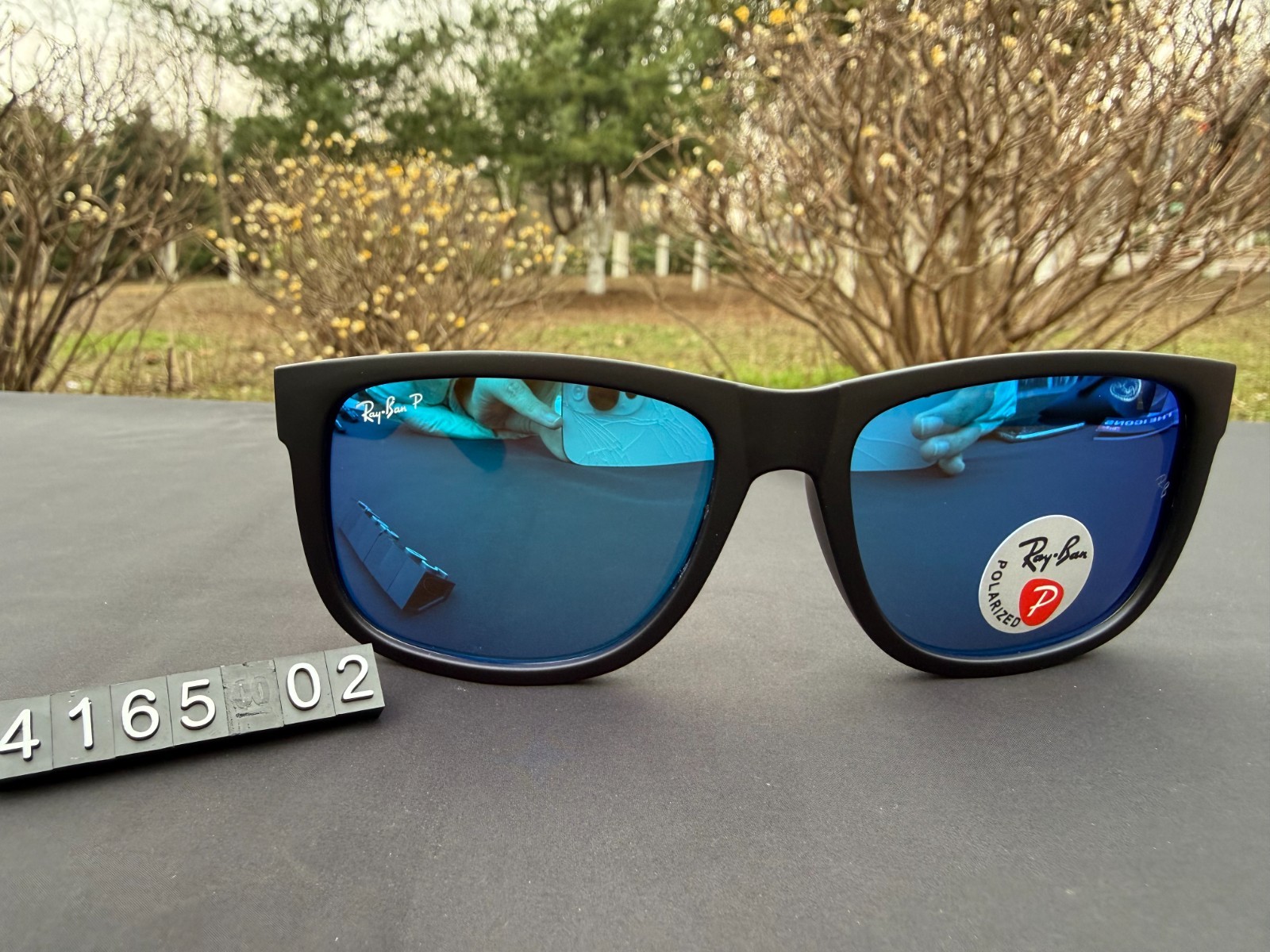 Ray-Ban RB4165 Sunglasses Matte Black Frame Polarized Blue Lens