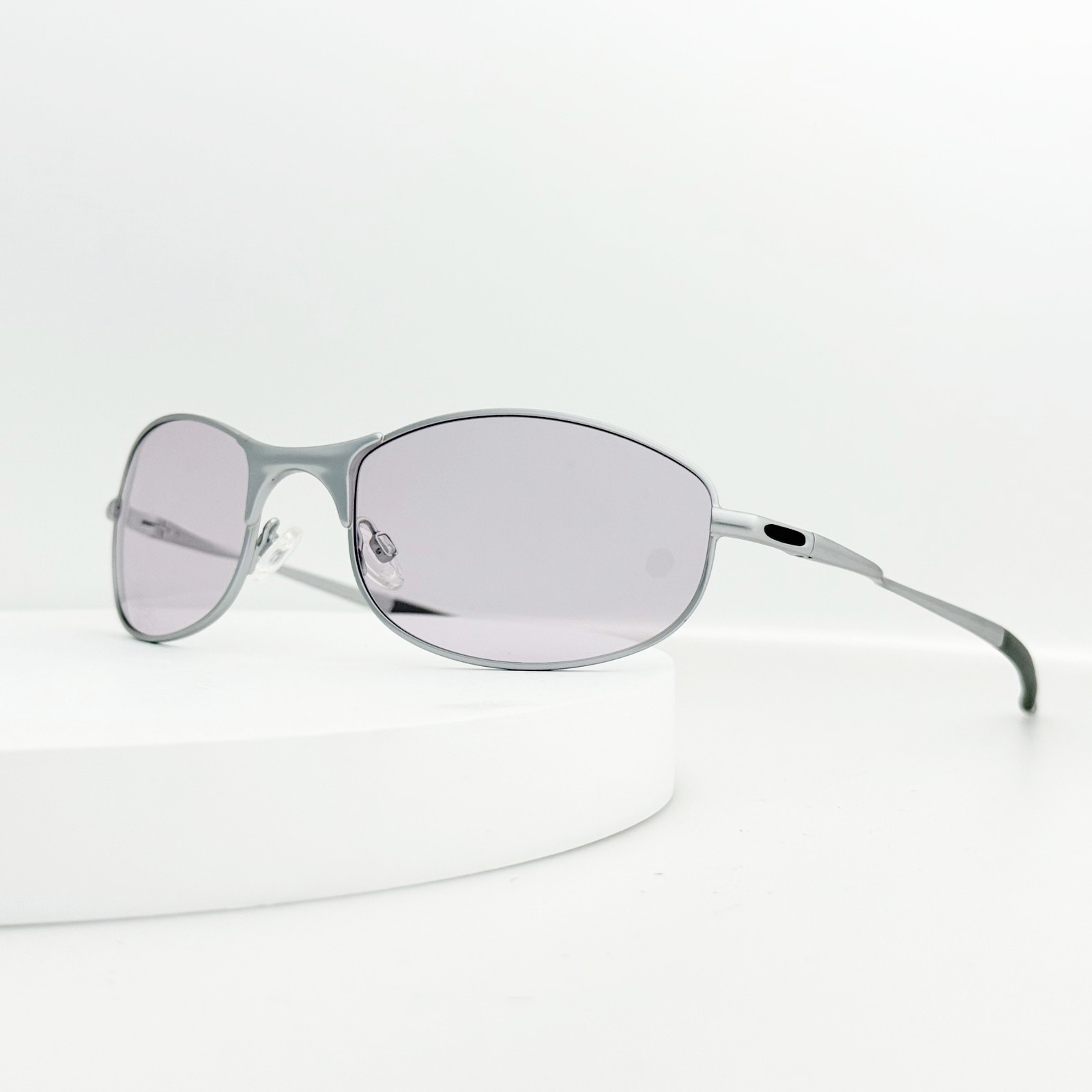 Oakley Tightrope OO4040 polarized sunglasses, silver frame / light purple lenses