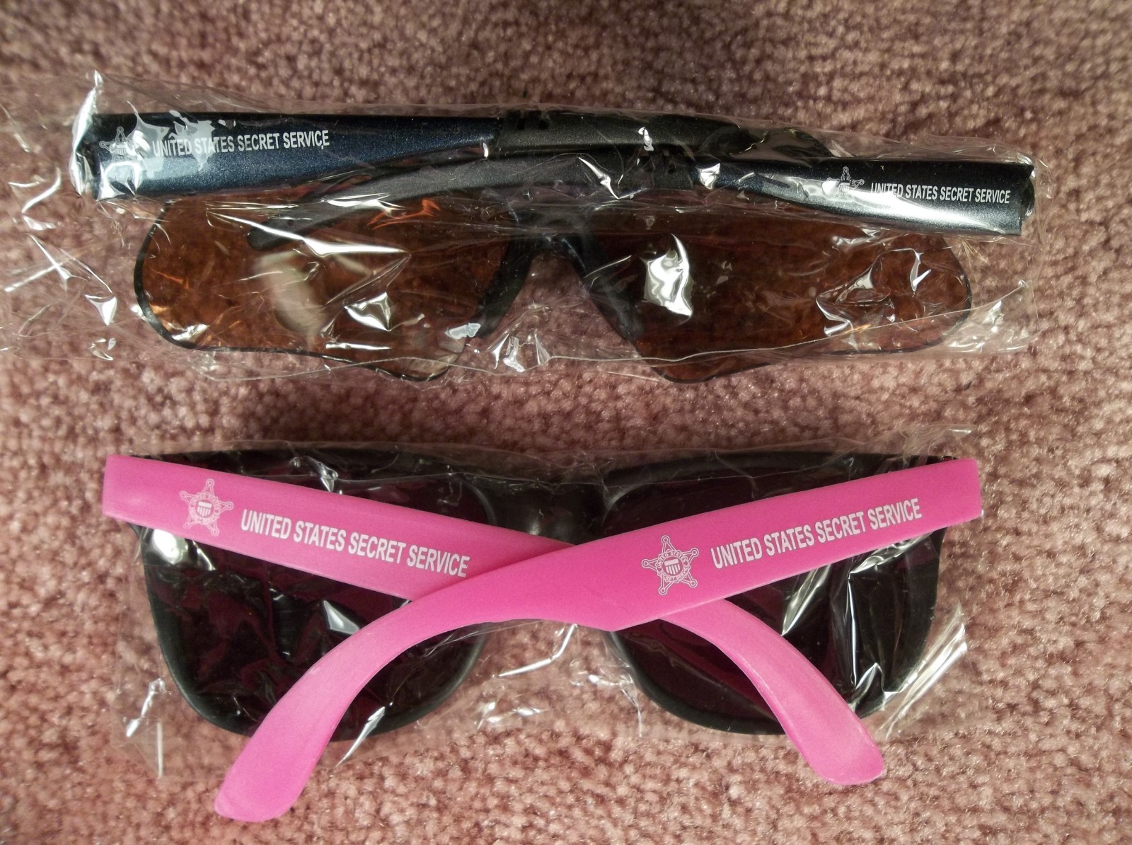 TWO PAIR ADULT UNITED STATES SECRET SERVICE NAME MARKED & USSS LOGOED SUNGLASSES