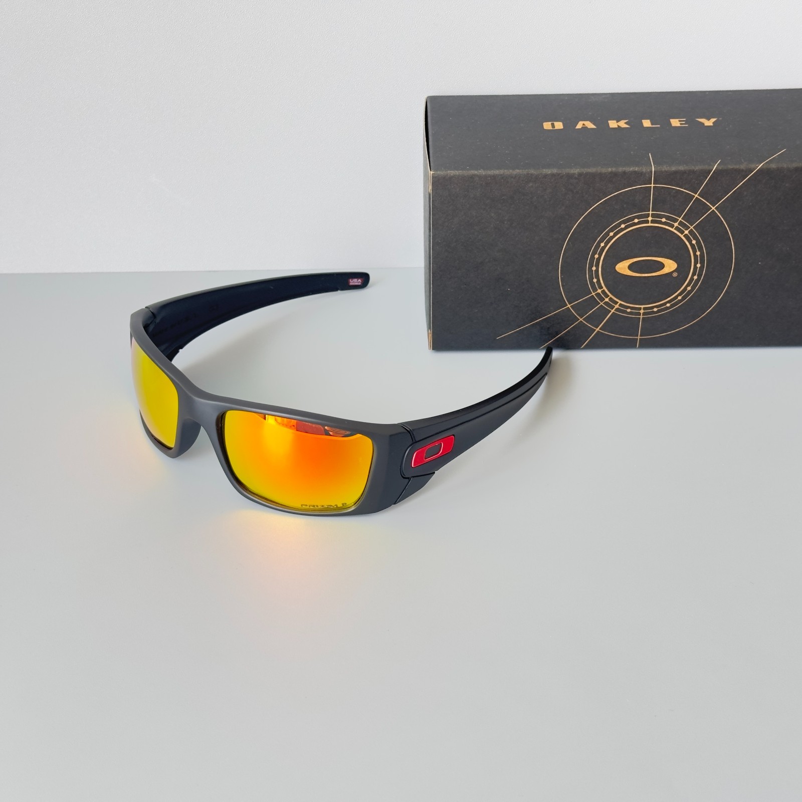 Oakley Fuel Cell OO9096 Polarized Sunglasses Matte Black Red Lens