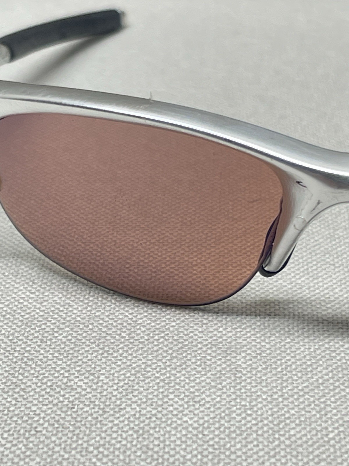 Oakley Men’s Lightweight Wrap Polarized Sunglasses Silver Metal Brown Lens