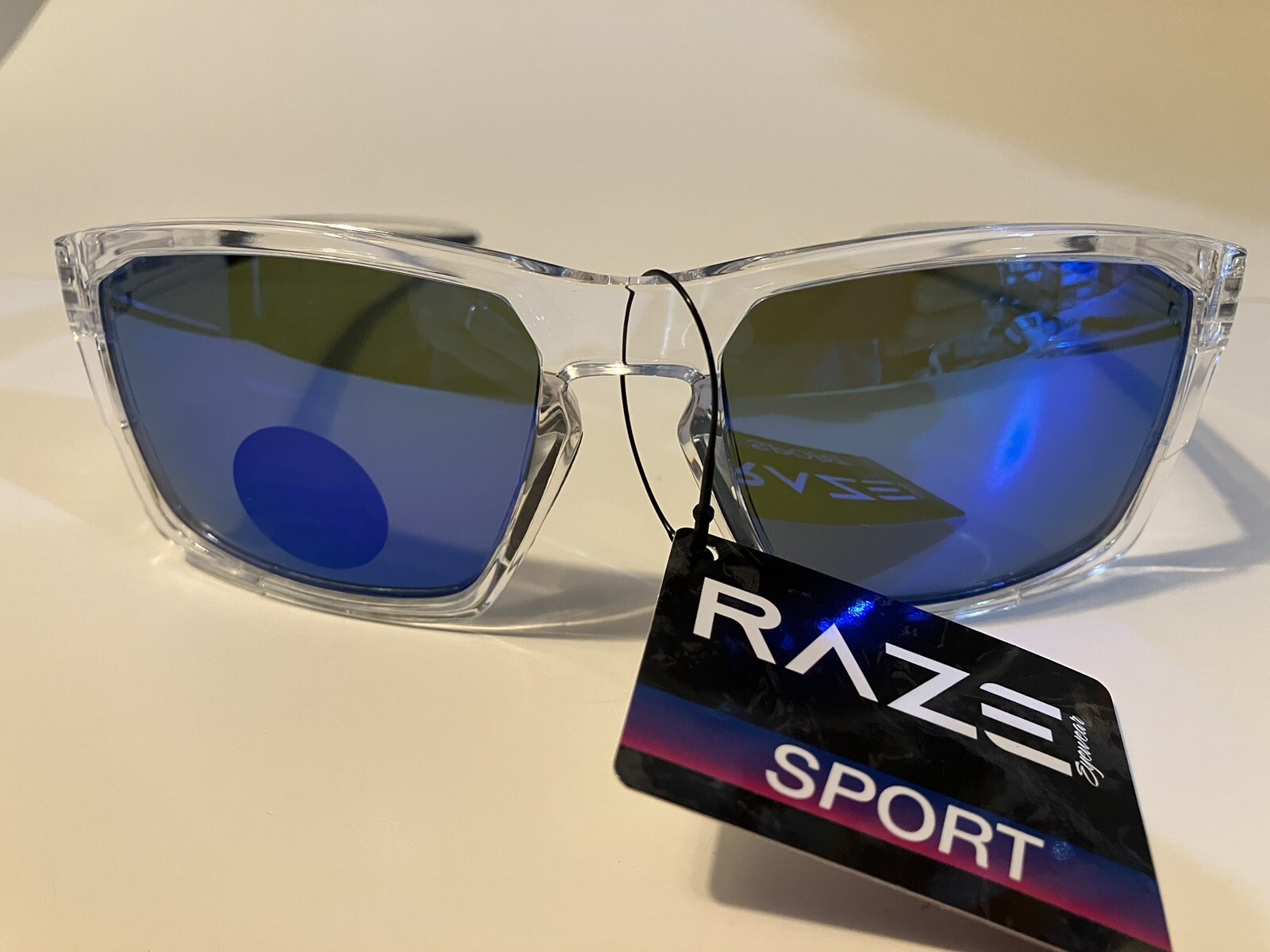RAZE Eyewear Sunglasses Journey mirrored blue lens clear frame 26922