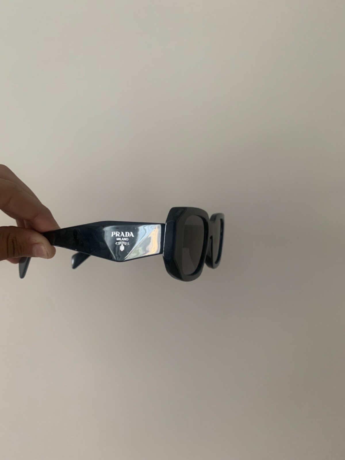 PRADA PR 27ZS Men’s Irregular Sunglasses – Black/Gray (PR 27ZS 16K08Z 54)
