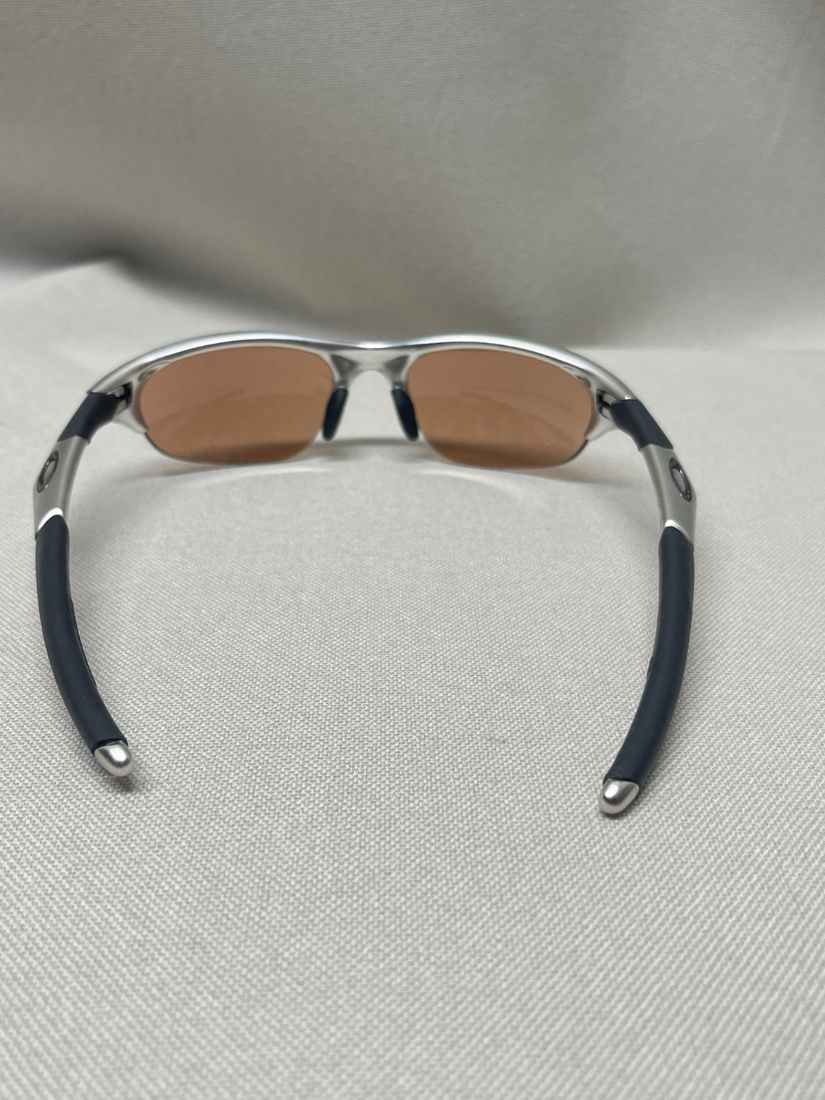 Oakley Men’s Lightweight Wrap Polarized Sunglasses Silver Metal Brown Lens