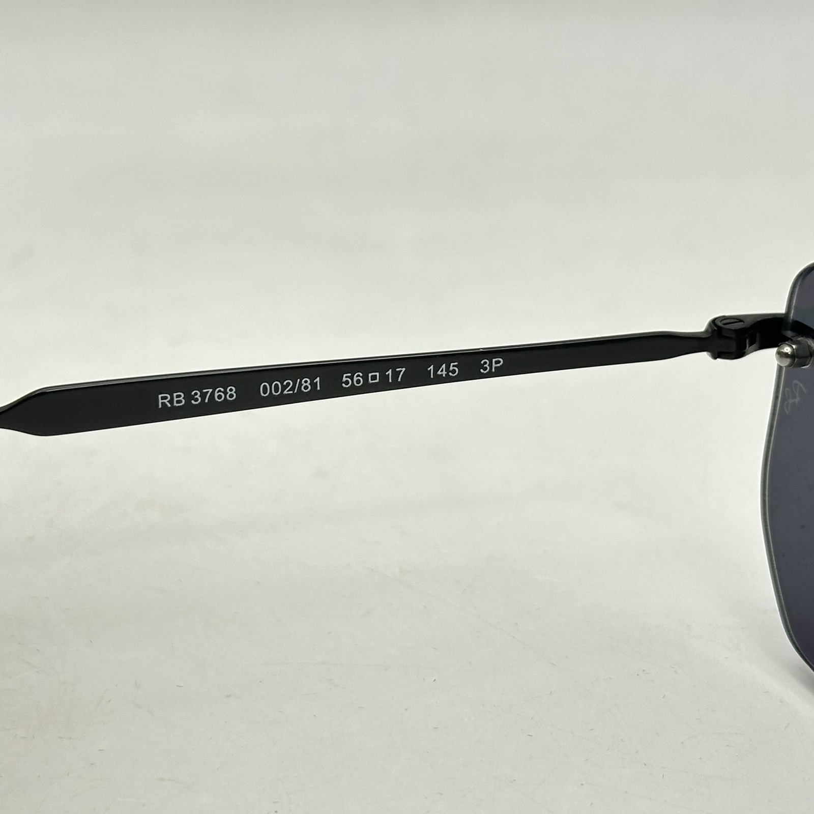 Ray Ban Mens Rimless Irregular Thin Metal Polarized Sunglasses RB3768 Black/Gray