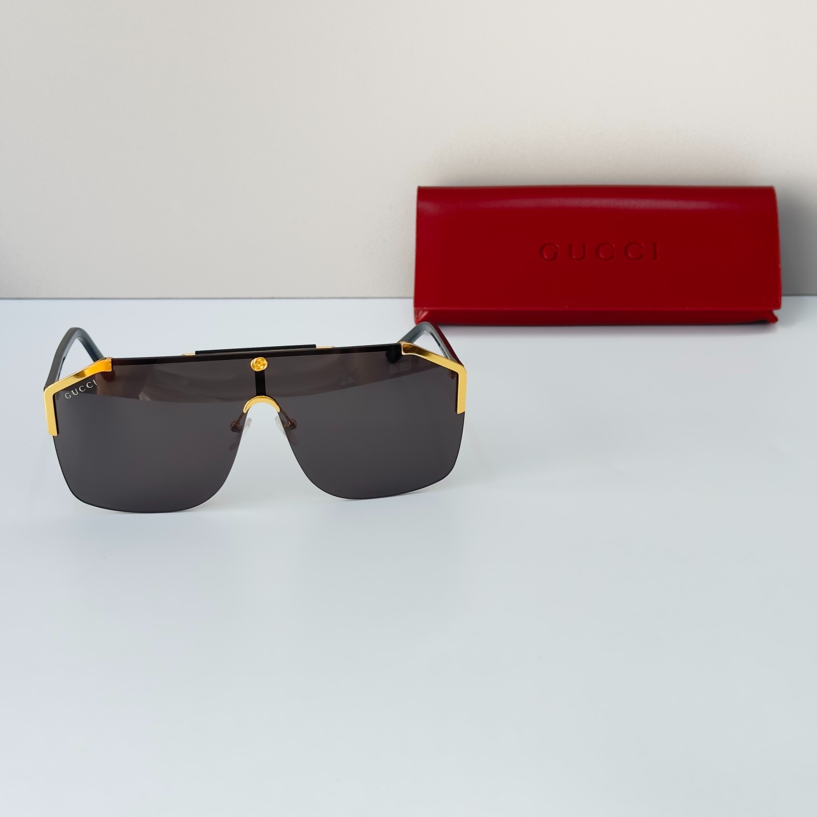 Gucci GG0291S Black Gold Frame Shield Black Lens Sunglasses Italy Luxury