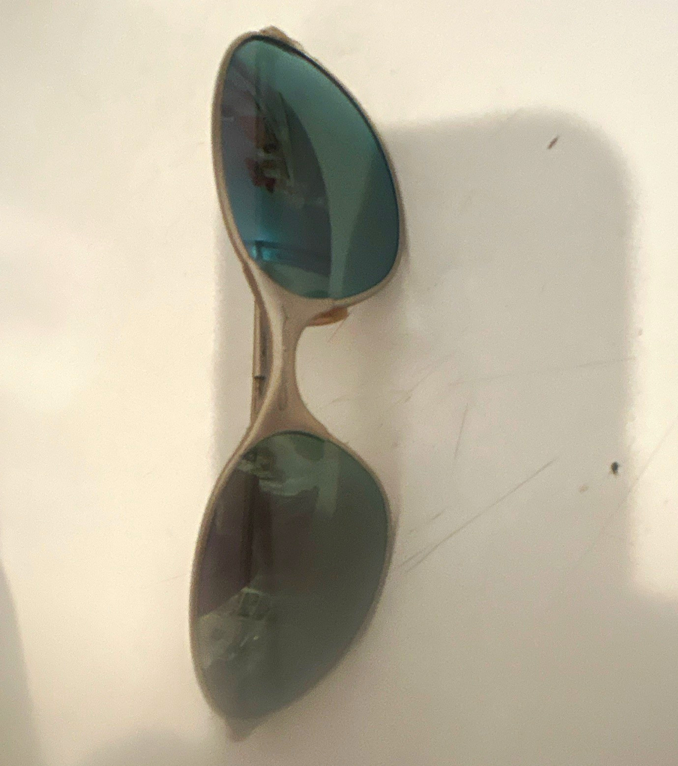 OakleyOval Metal Sunglasses Silver Frame Green Tinted Plastic Lenses