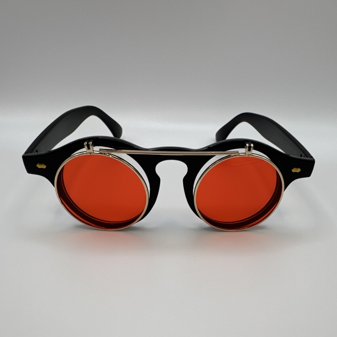 All Round Sunglasses Black Plastic/Metal Frame Red Tinted Plastic Lenses UV400