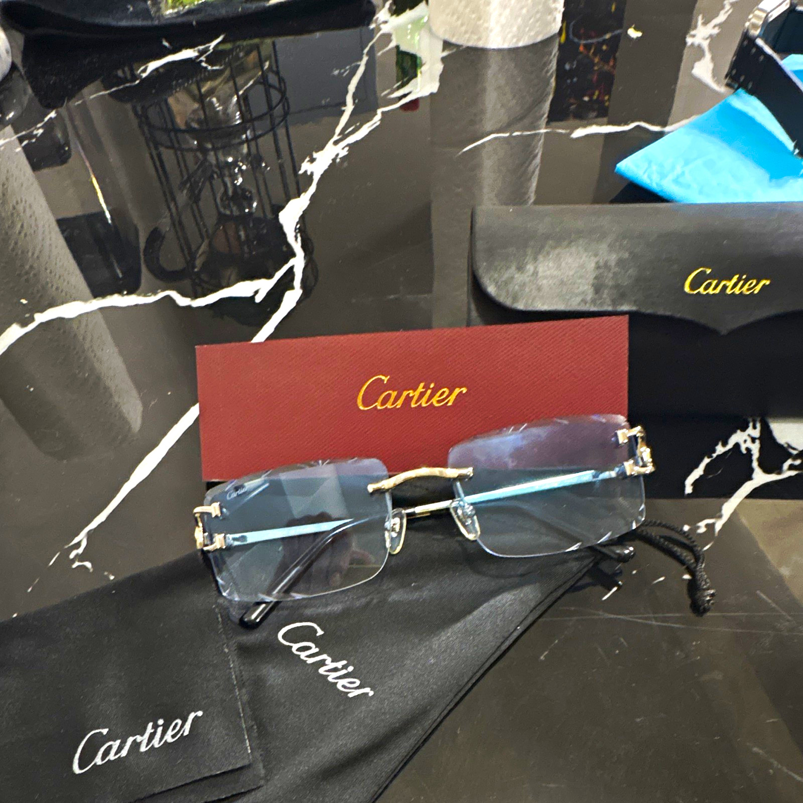 Cartier CT04620S Rimless Rectangle Sunglasses Blue Tinted Lenses Gold Metal 140