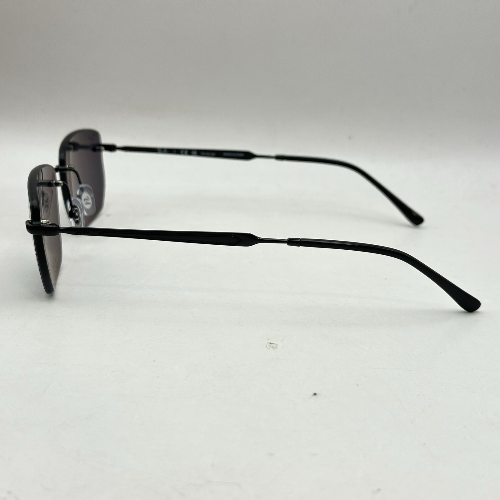 Ray Ban Mens Rimless Irregular Thin Metal Polarized Sunglasses RB3768 Black/Gray