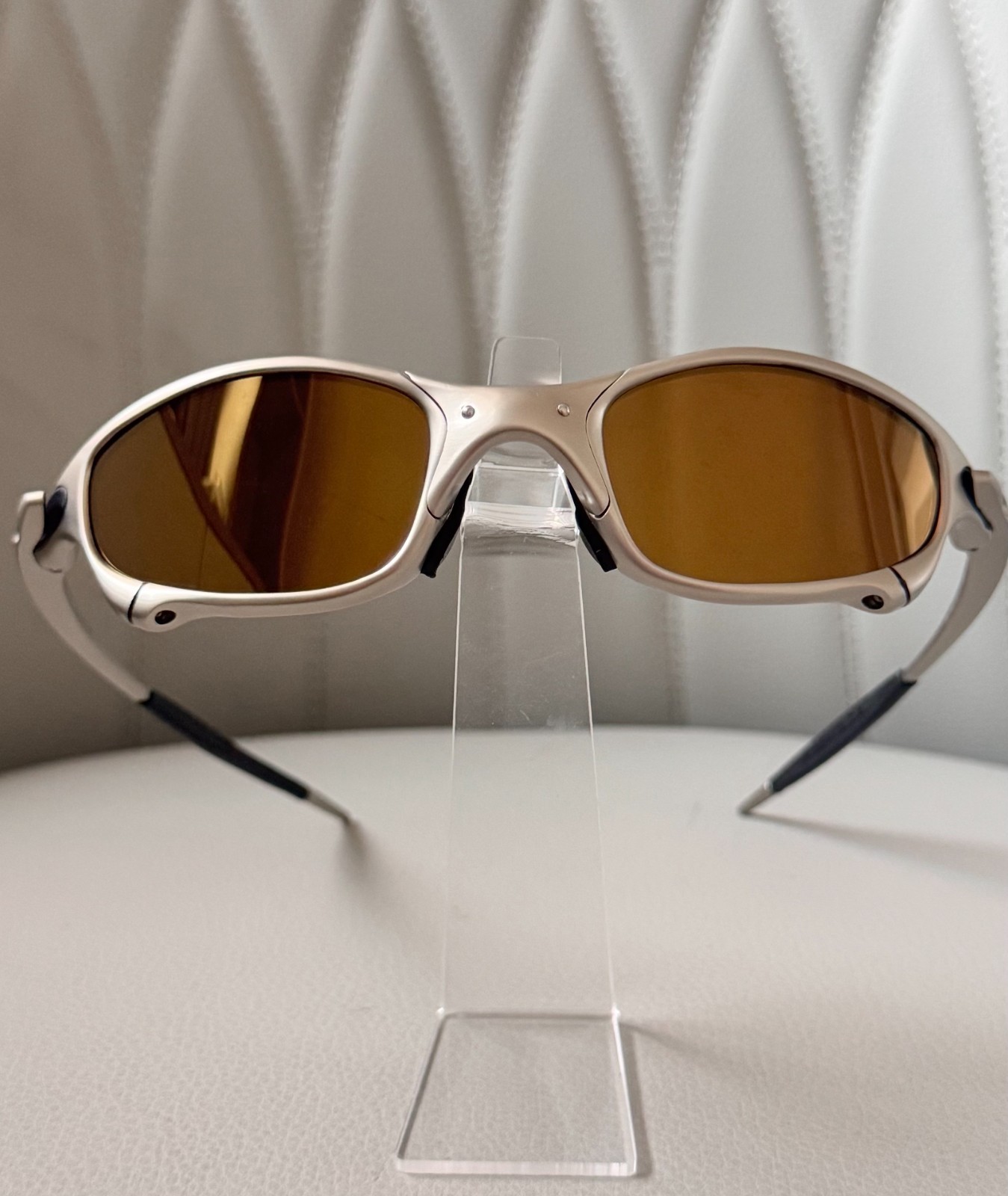 Oakley Juliet 1.0 X sunglasses, silver metal frame. Brown-tinted lenses