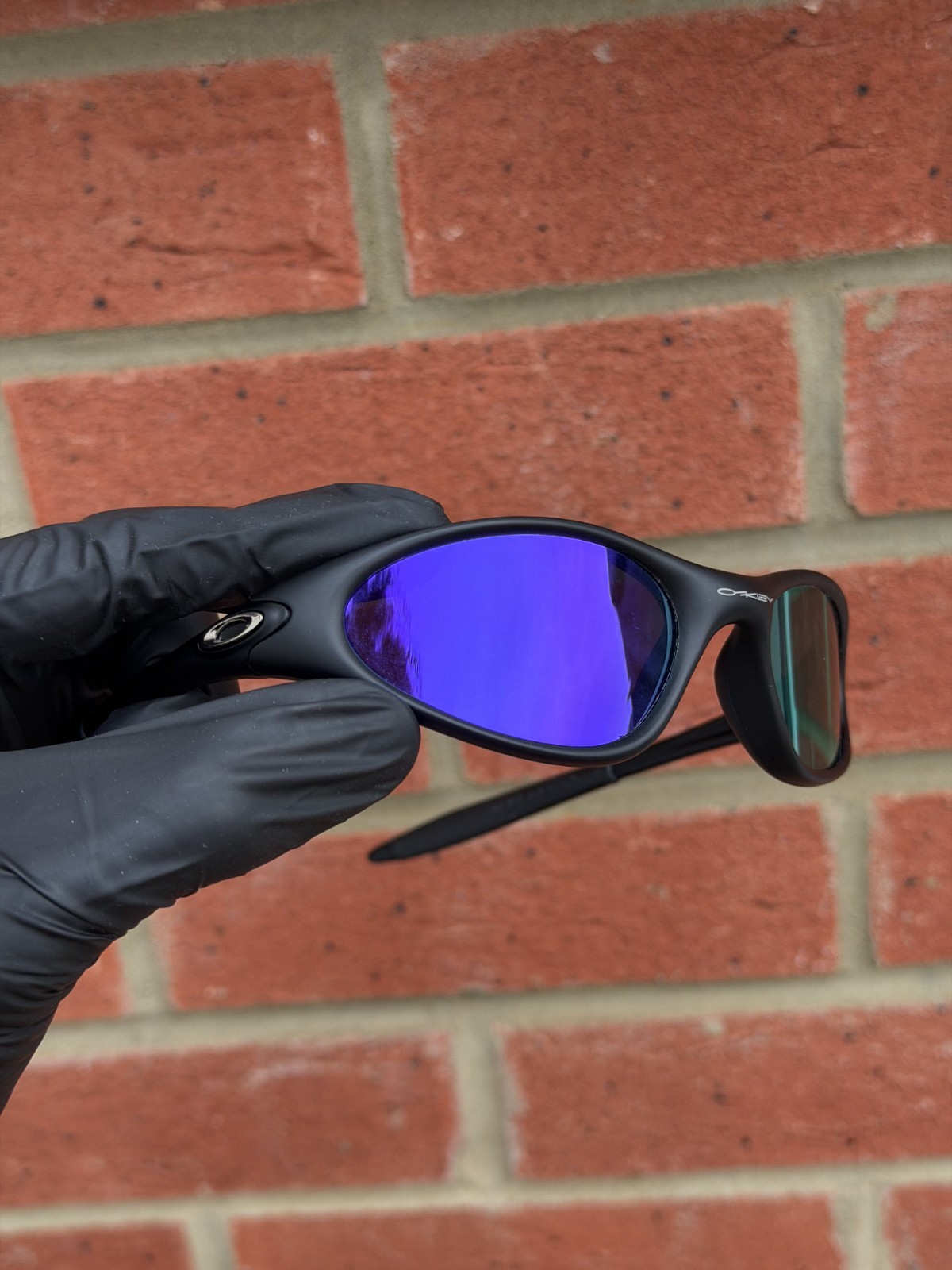 Retro Oakley Minute 1.0 Polarized Sunglasses Black Frame Purple Lenses